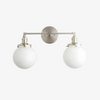 Lumio Globe Glass Globe Vanity Light - Modern Two Light Bathroom Sconce