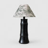 Dark brown ceramic table lamp with botanical shade