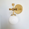 Minimalist Versatile Gold Wall Sconce With White Glass Globe