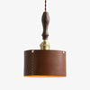 Dark brown stitched leather pendant lamp with wood handle