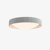 Gray ribbed flush mount ceiling light on white background