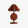 Brown folded leather table lamp with black metal frame