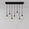 Lumivelle Sculptural 7-Light Chandelier – Adjustable Height Modern Glass Pendant