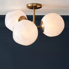 Pawrior Sculptural Ceiling Light – Modern Flush Mount with Brass & Glass Finish