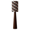 Striped fabric floor lamp with tapered wood grain base on white background