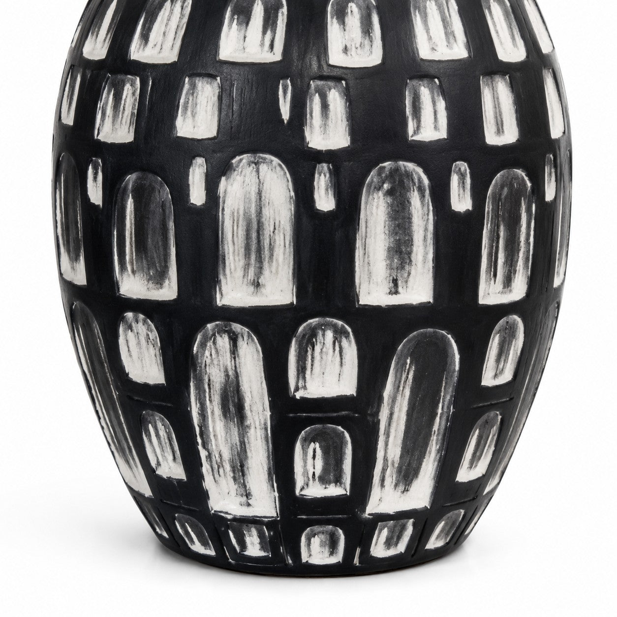 Black and white hand-finished ceramic base detail