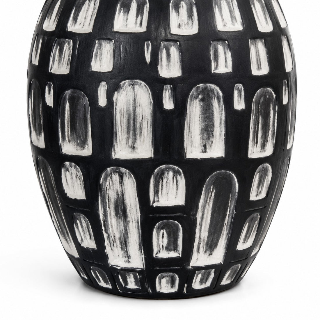 Black and white hand-finished ceramic base detail