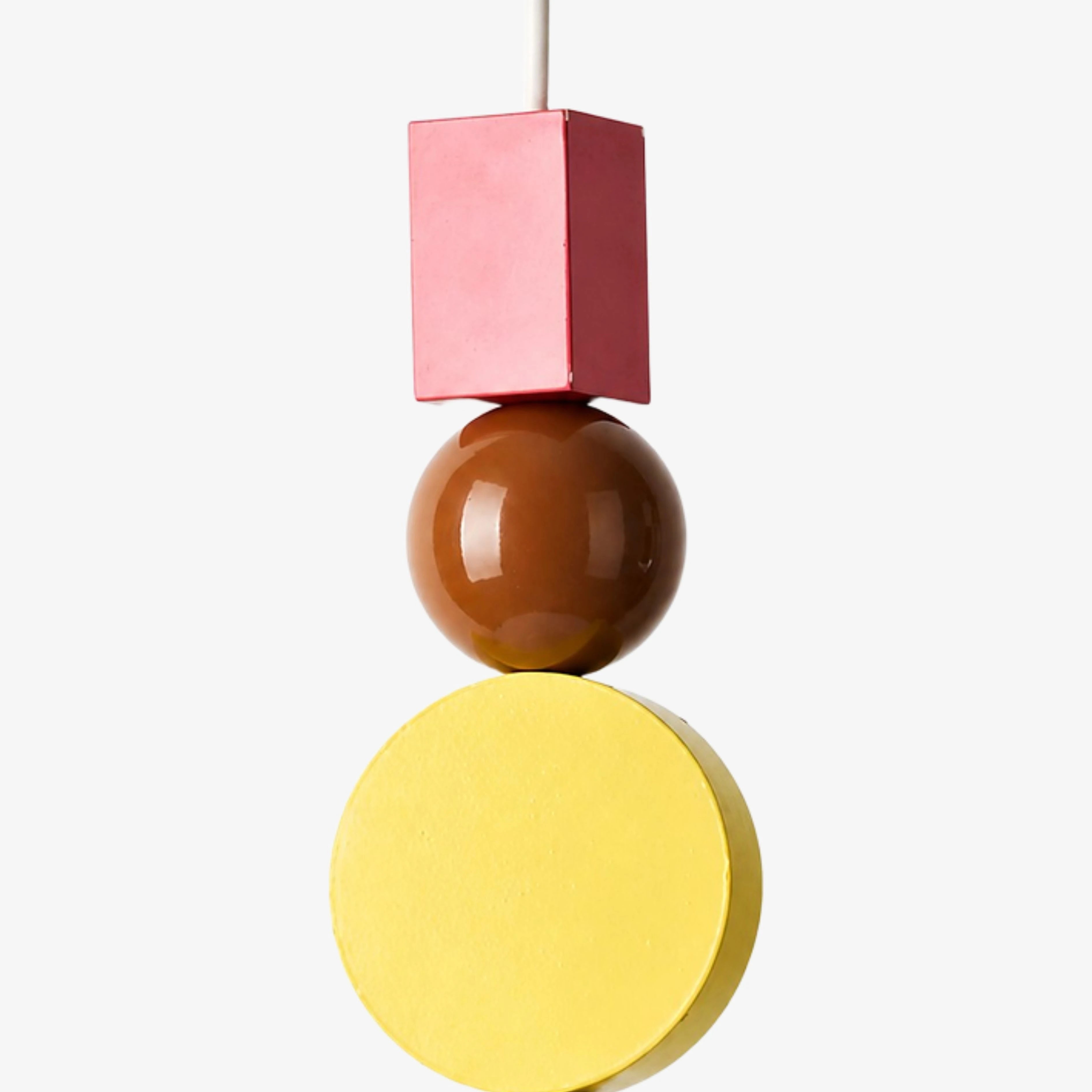 Red, amber, and yellow stacked ornament detail