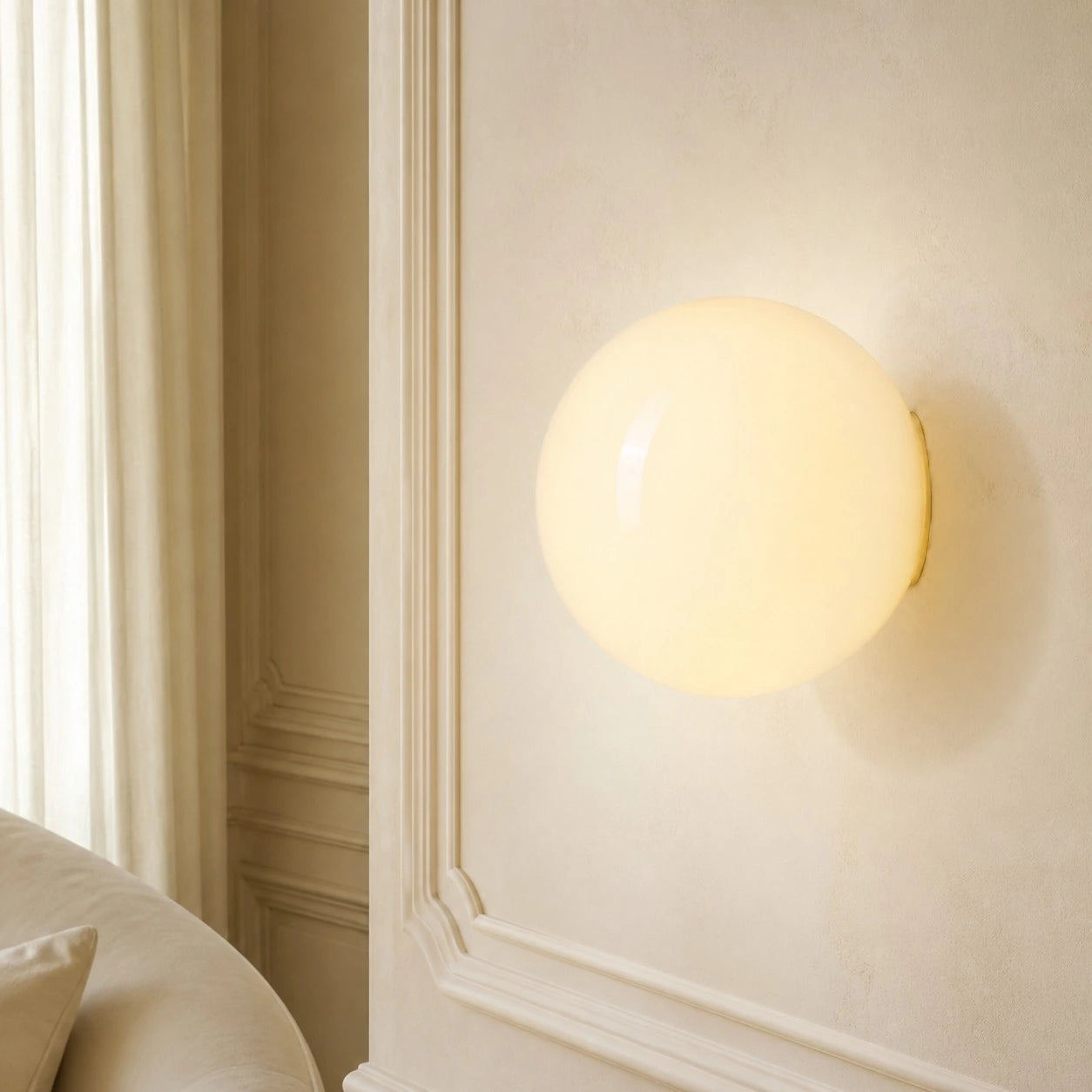 Cream Luma wall sconce in an interior