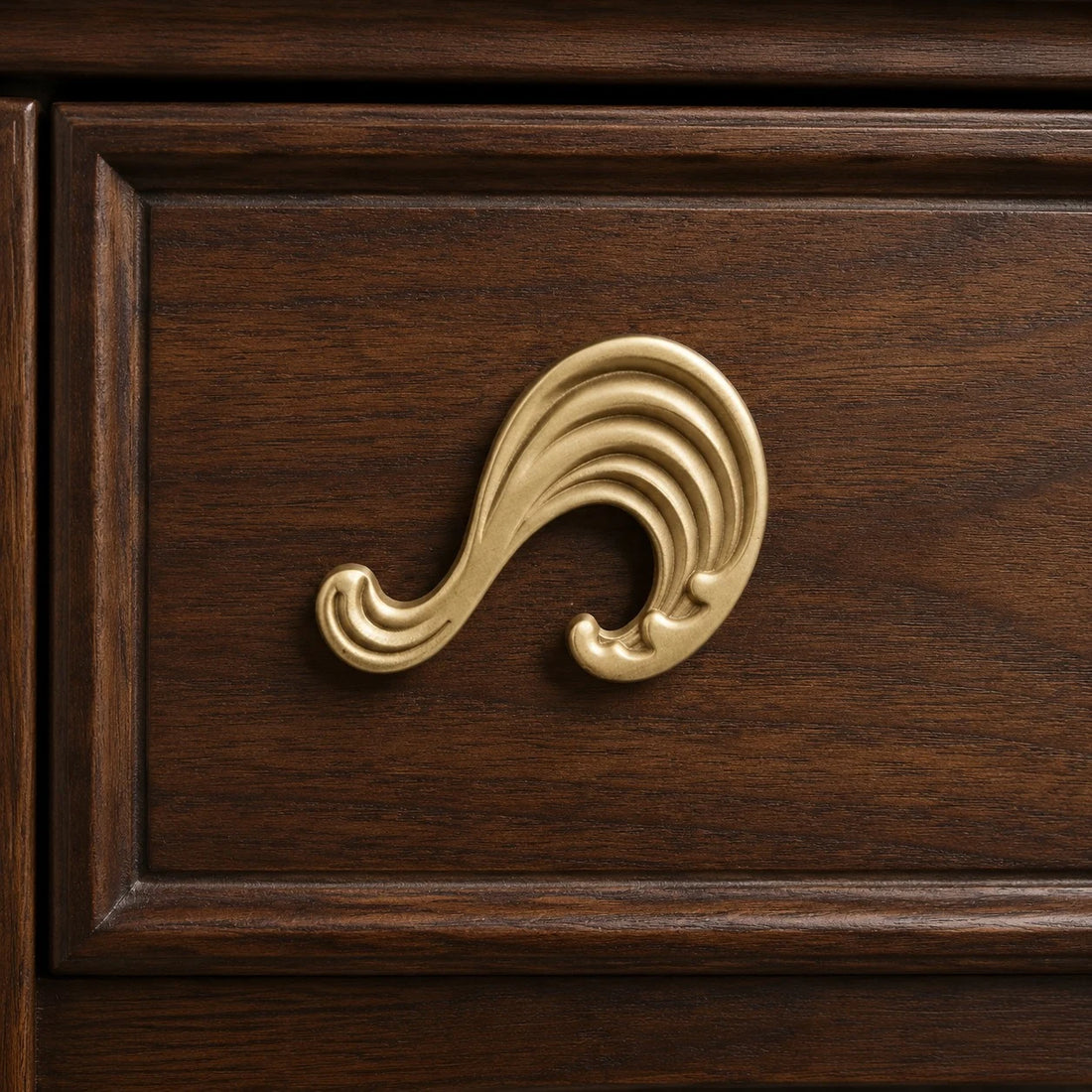 Wave cabinet knob in Natural Brass