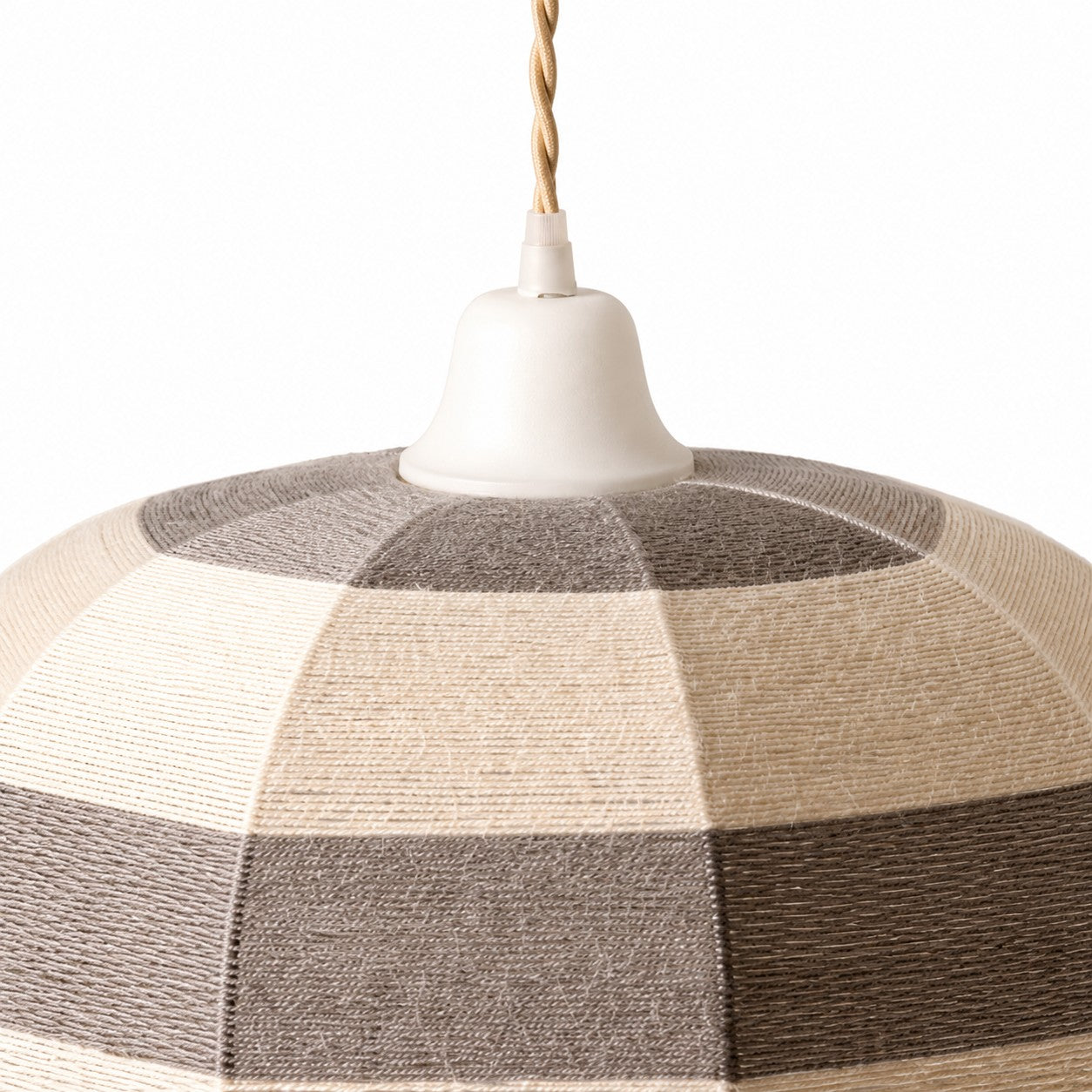 Close-up of white ceiling cup and hand-wrapped cotton thread shade