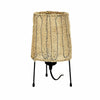 Natural plant fiber table lamp on white background