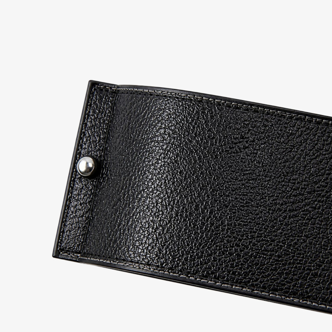 Black textured leather and polished metal fastener