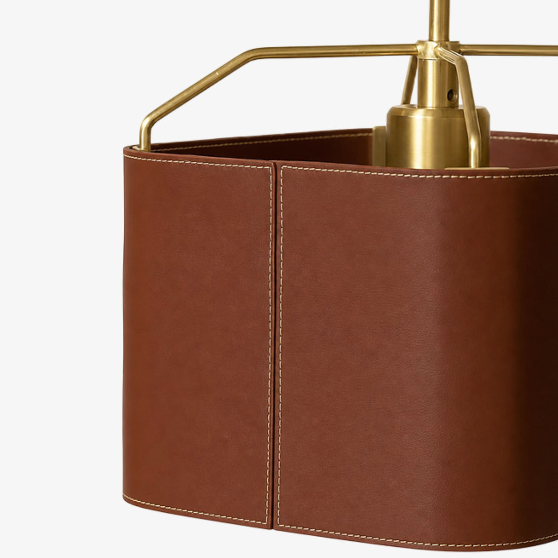 Chestnut leather shade stitching and brass frame detail