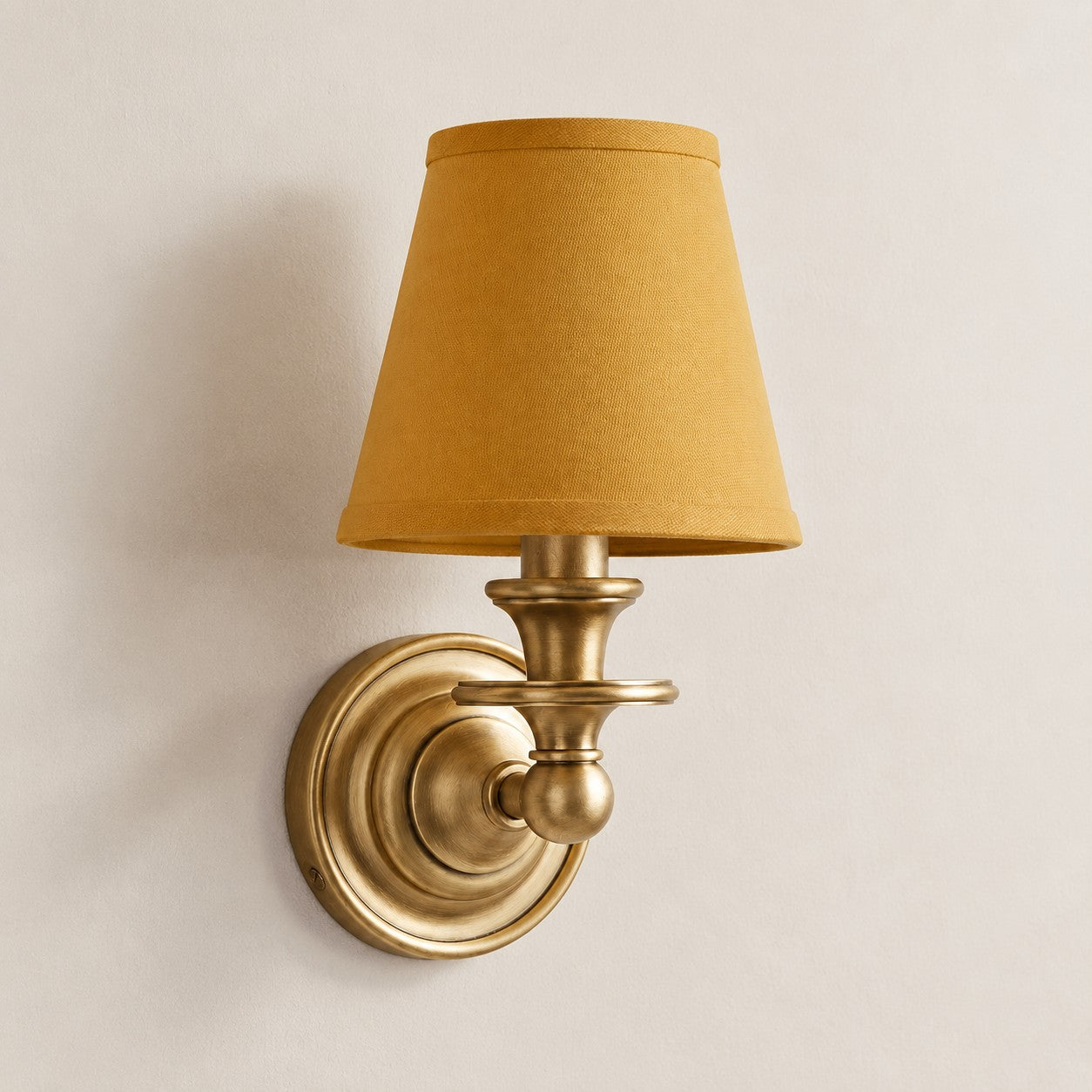 Kalvora wall sconce - Mustard Yellow Plain shade with Brass finish
