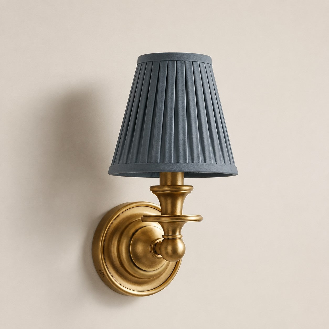 Kalvora wall sconce - Dusty Blue Pleated shade with Brass finish