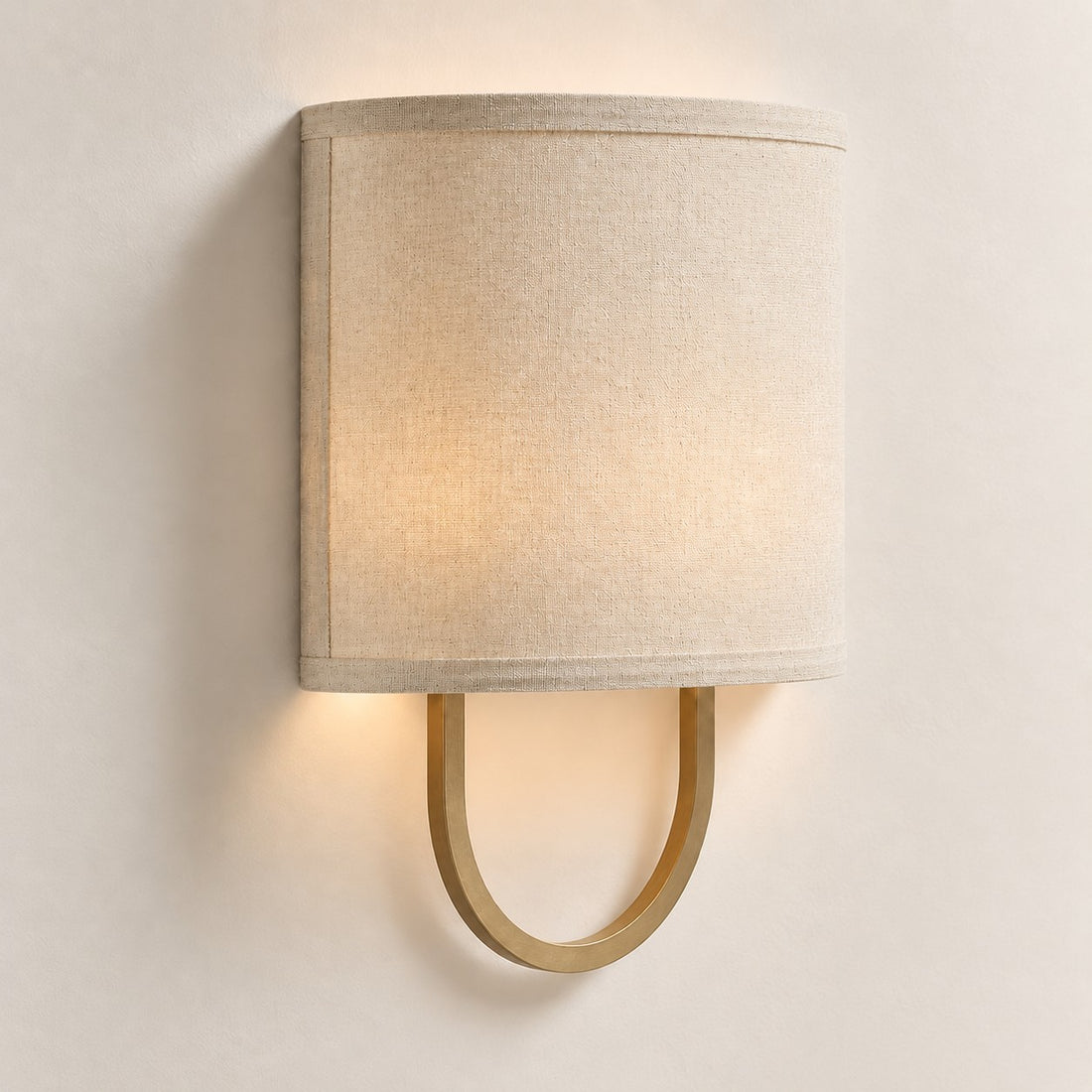 Nolvara wall light - Linen shade with Antique Brass finish