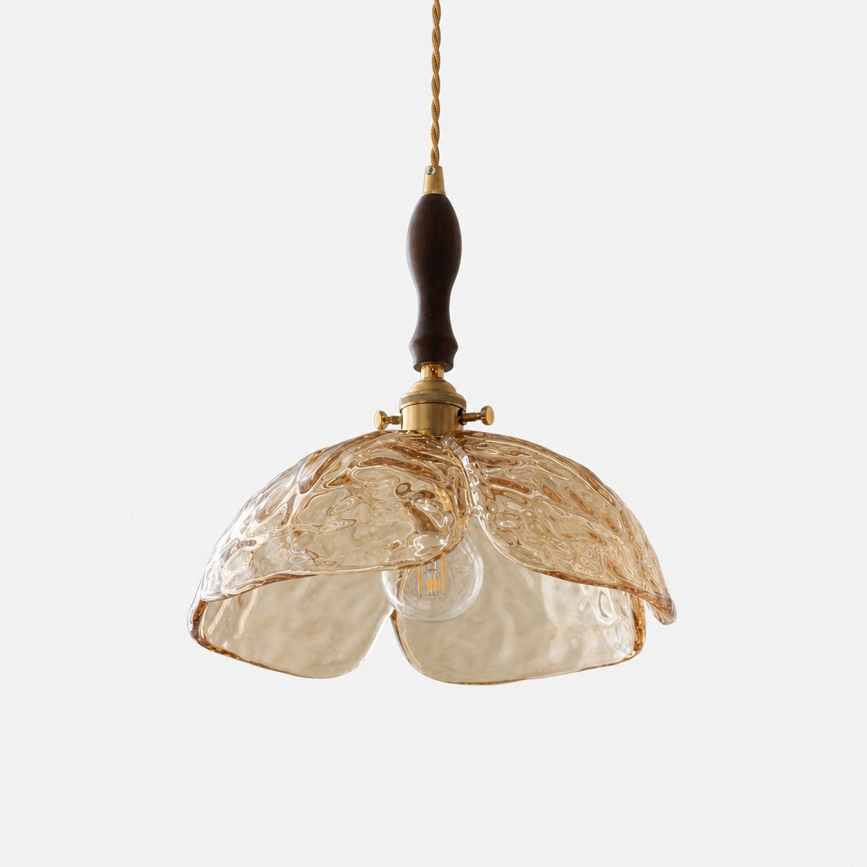 Single amber pressed-glass flower pendant with walnut accent