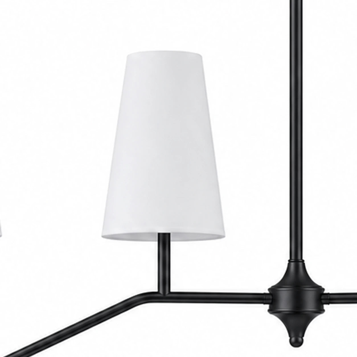 Black finish detail near white fabric shade and branch arm