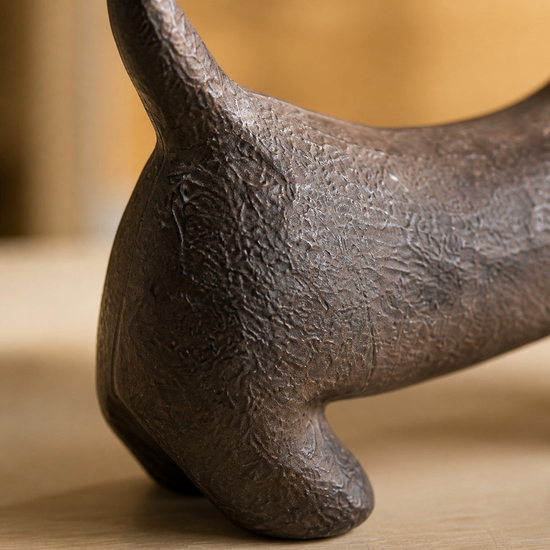 Cast iron Dachshund leg and tail detail