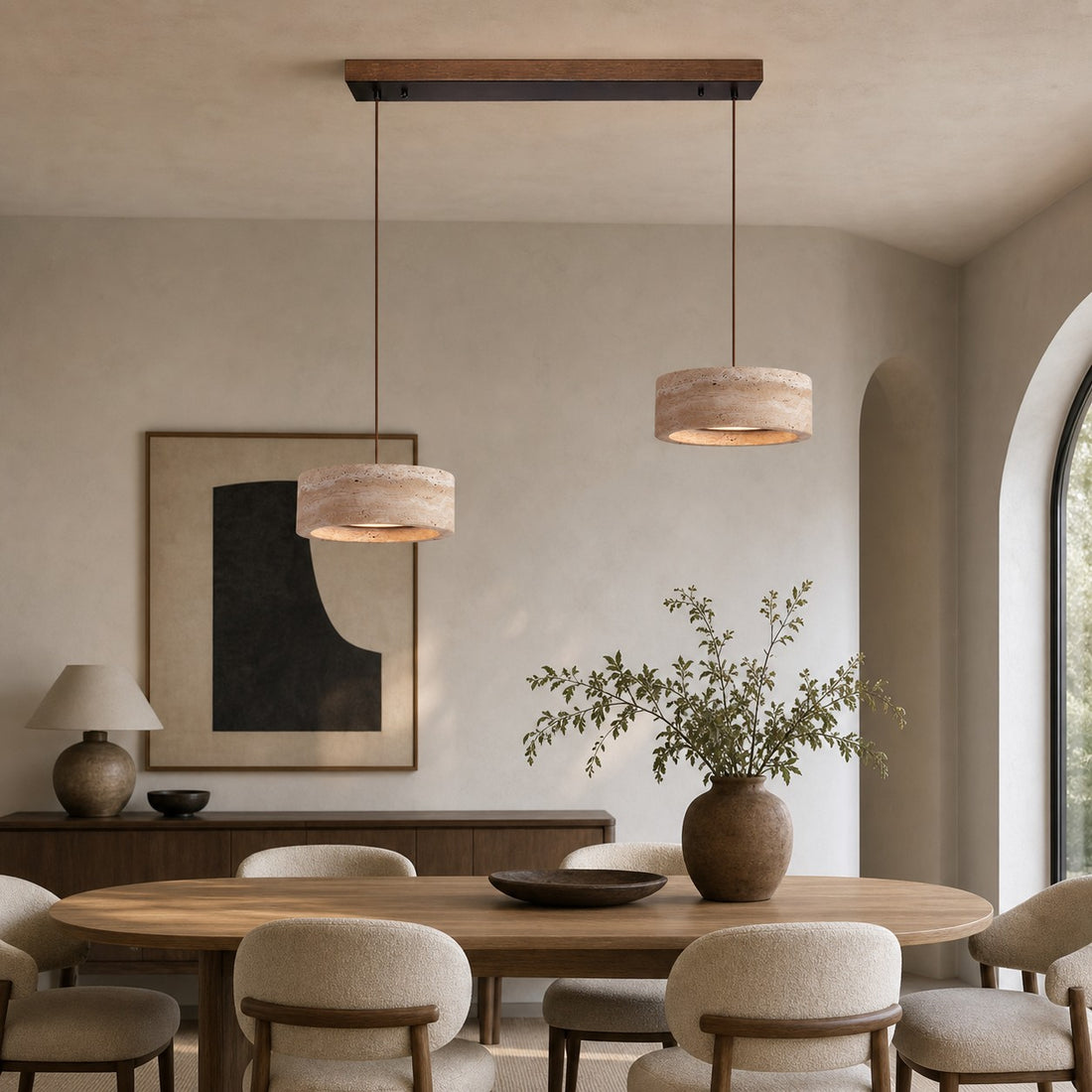 Two-light yellow travertine linear LED pendant in a dining room