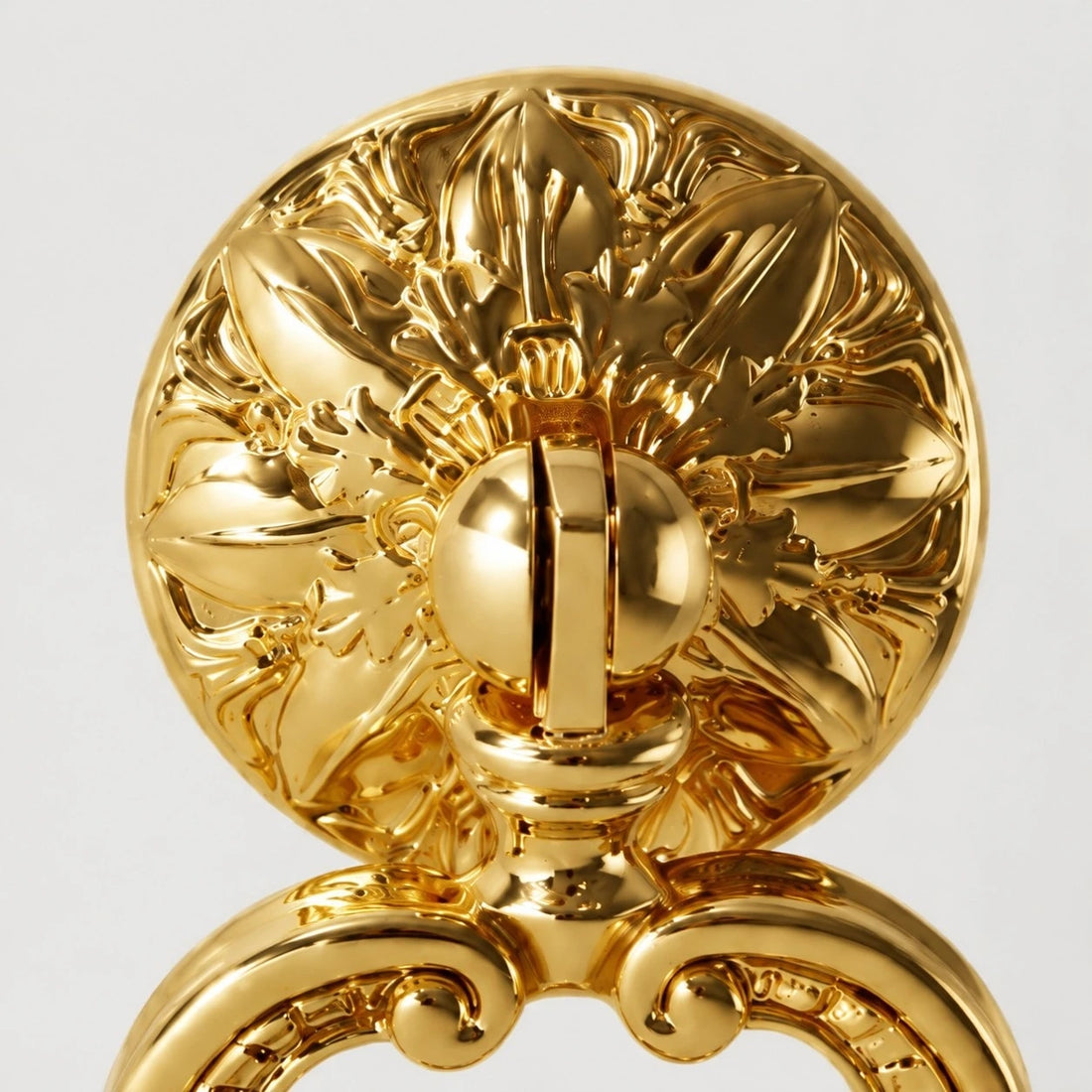 Close detail of the floral brass backplate