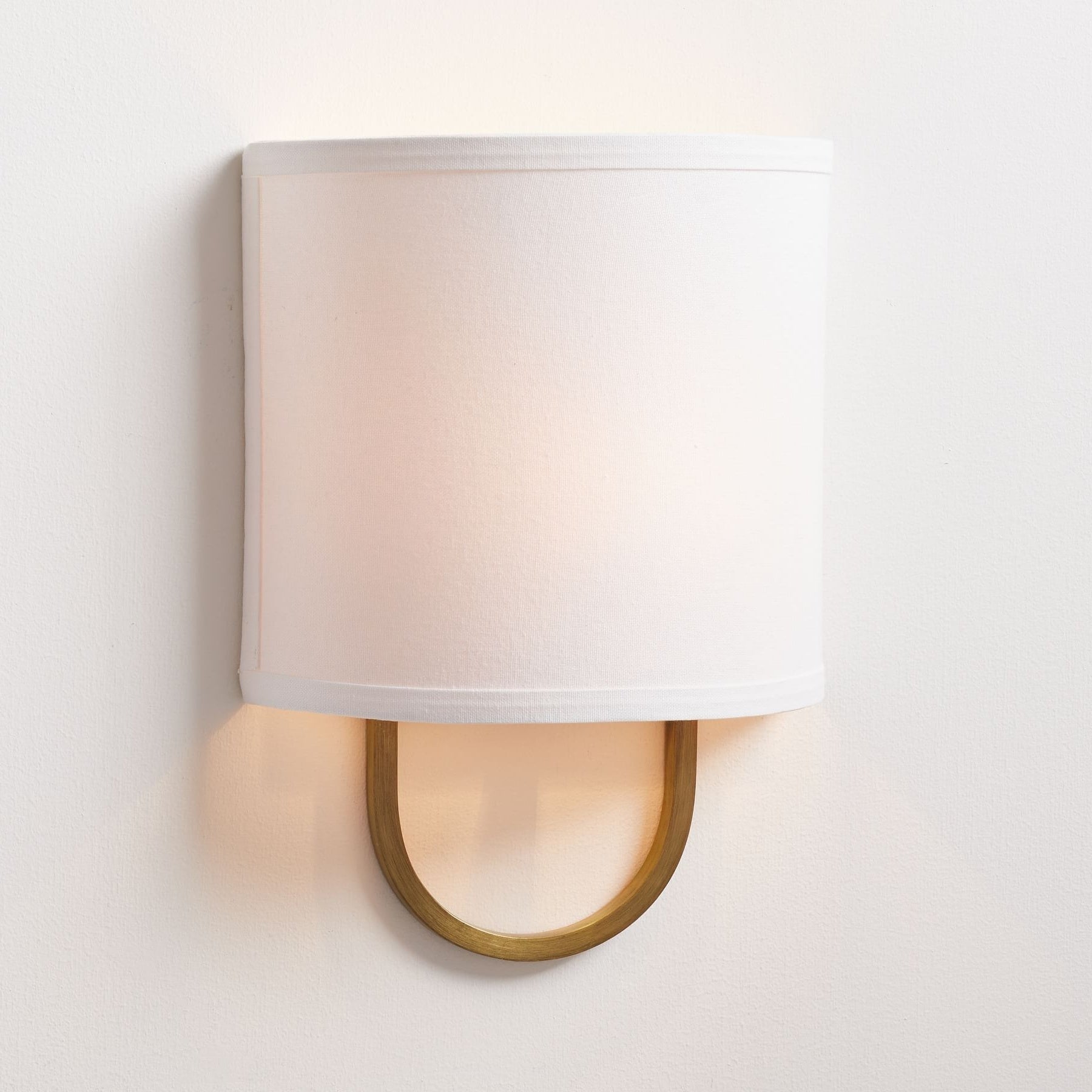 Nolvara Elegant Wall Light Featuring Soft Shade and Metal Arm