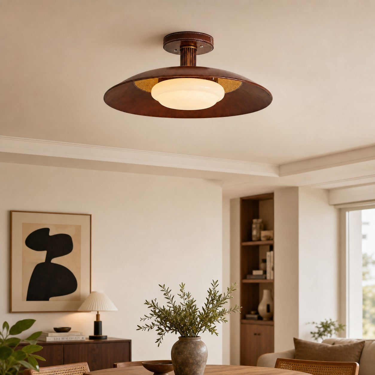 Leather disc ceiling lamp in a vintage living room