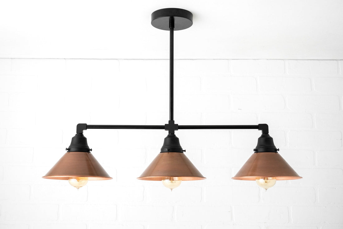 Conique Metal Aged Copper Three-Light Pendant – Sleek Industrial Fixture for Dining Rooms