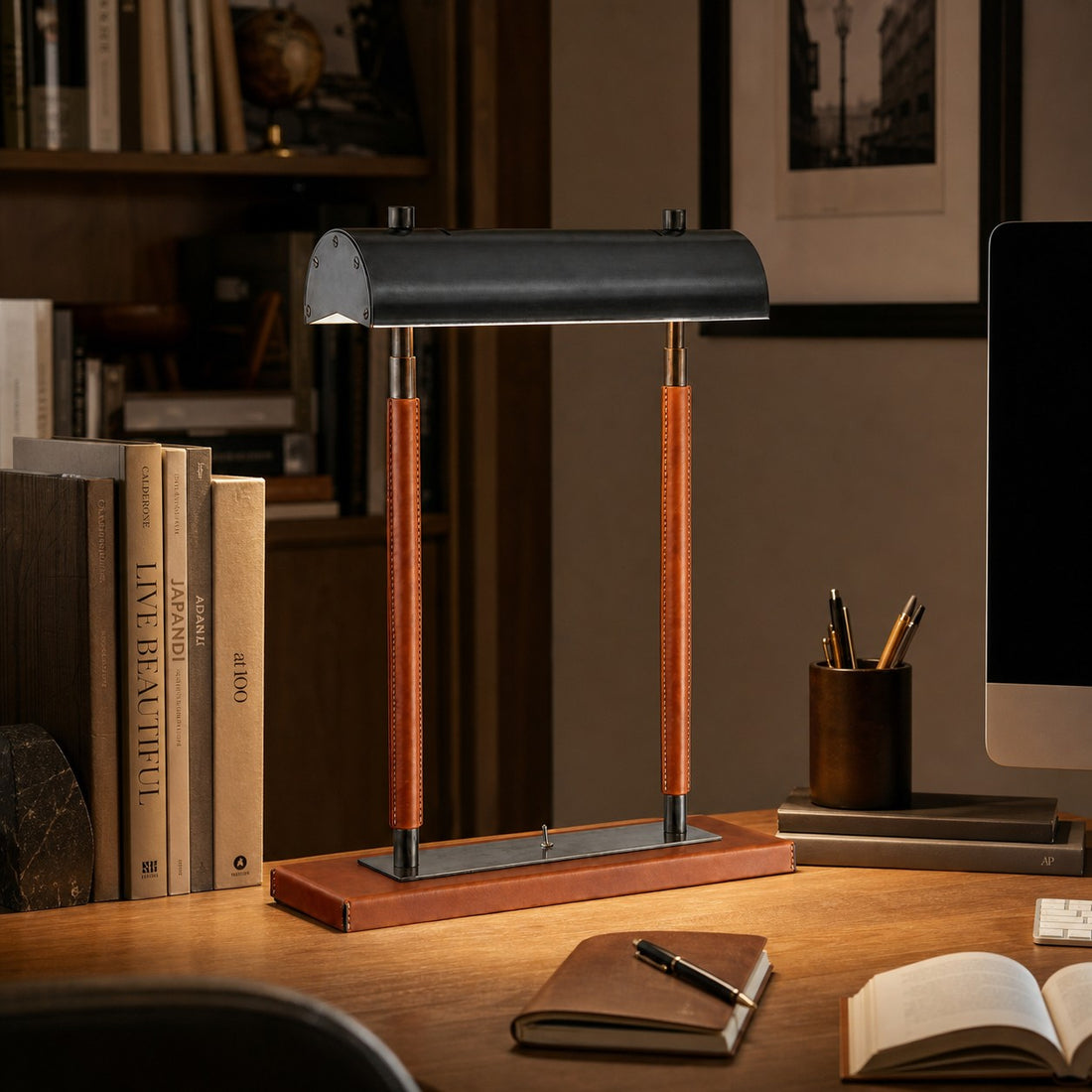 Orange leather table lamp in a dark study