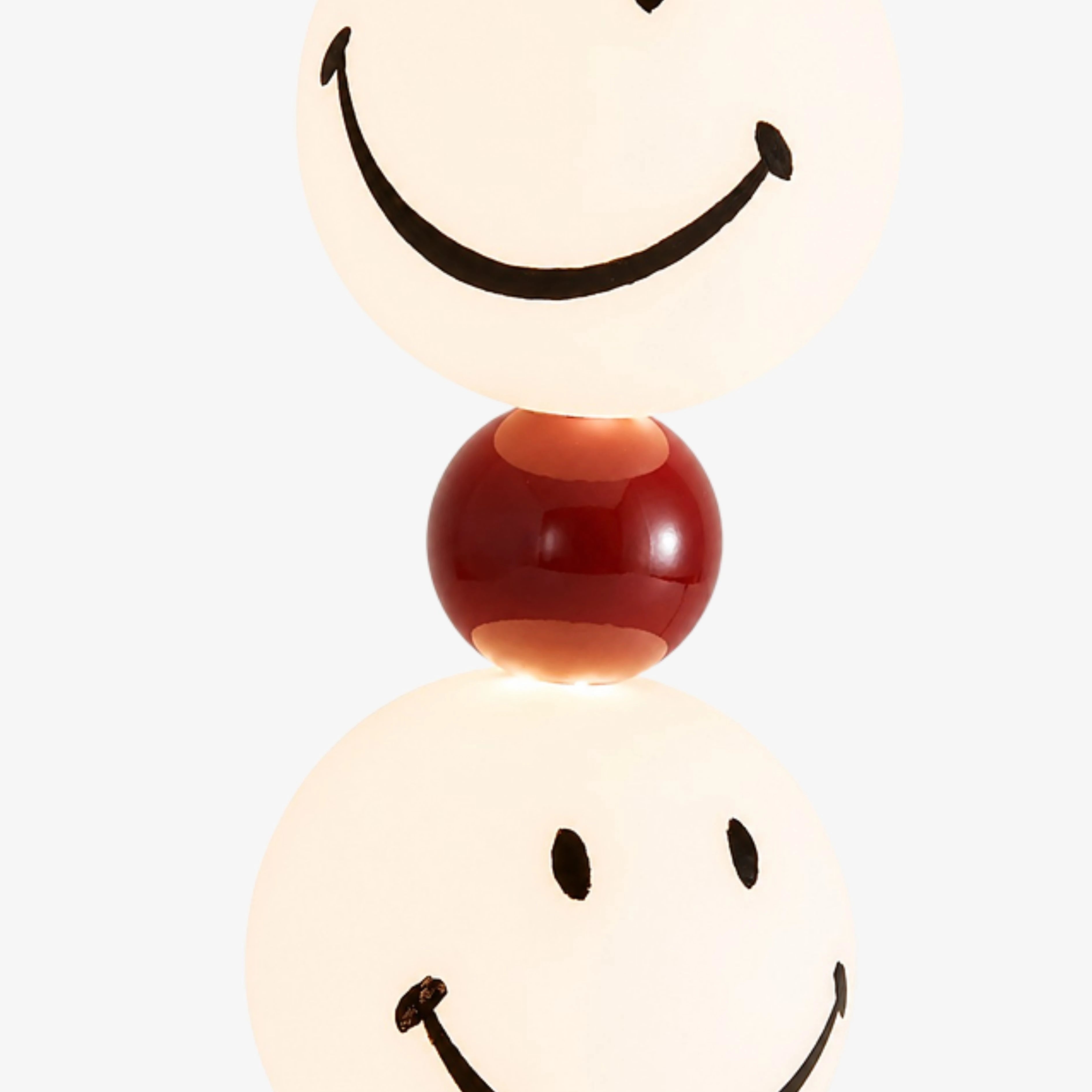 Glowing smiley globes and red center sphere detail