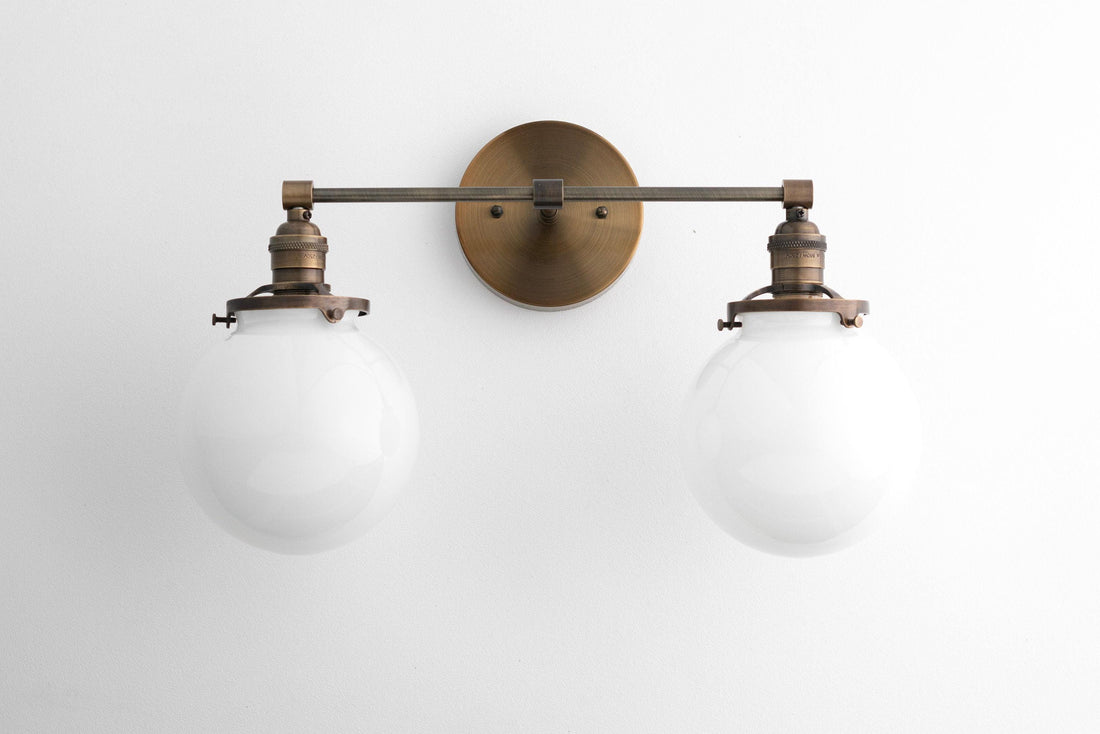 Lumio Globe Glass Globe Vanity Light - Modern Two Light Bathroom Sconce
