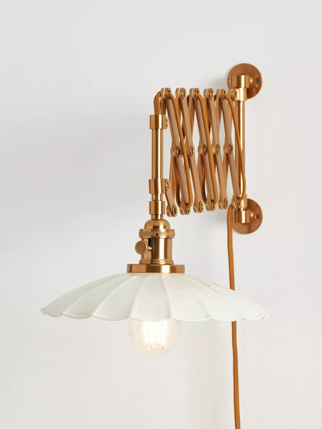 Furium Scalloped Accordian Plug-In Sconce - Brass Wall Light Elegance