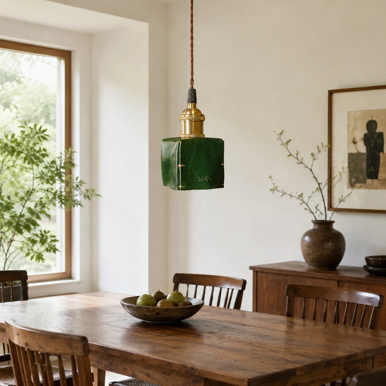 Green pendant in dining room scene