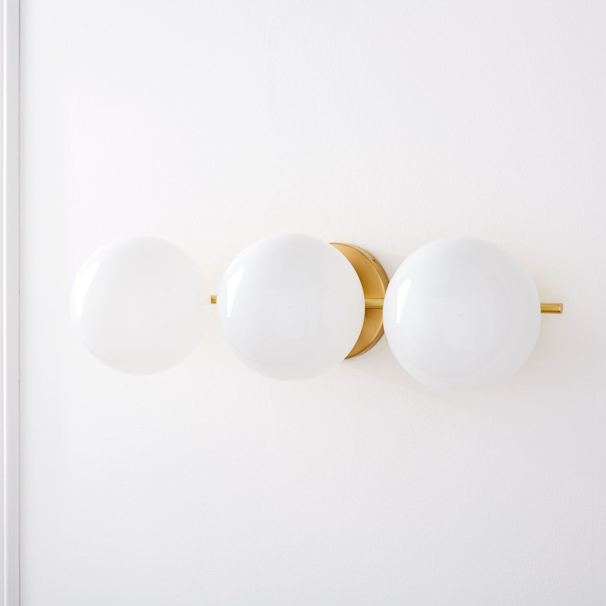 Alessora Mid-Century Modern 3-Light Wall Sconce - Metal Frame White Glass Globes