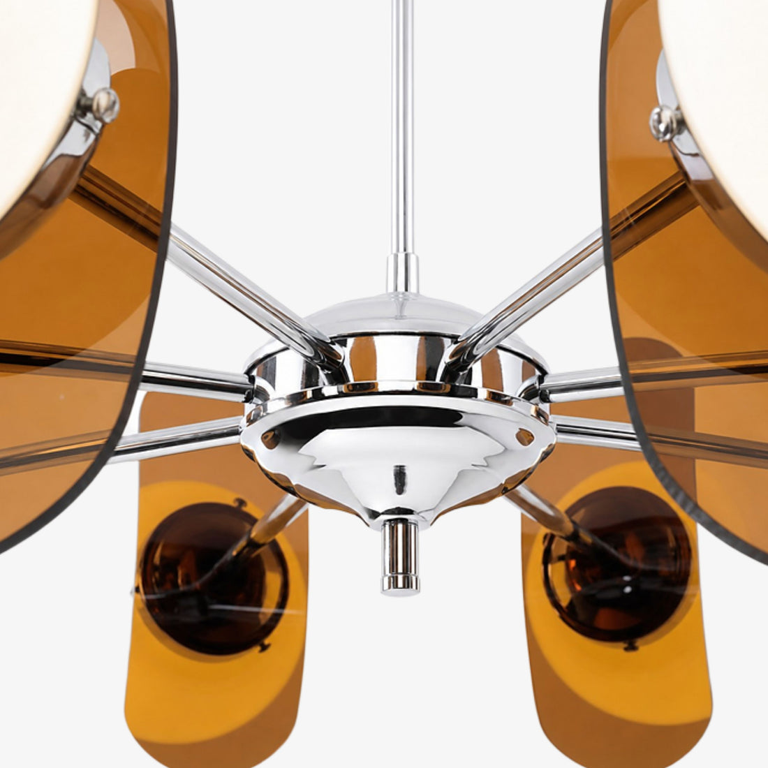 Polished metal chandelier hub and arm detail