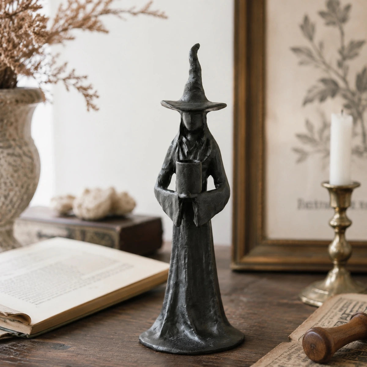 Single Candle Aura candlestick in vintage tabletop scene