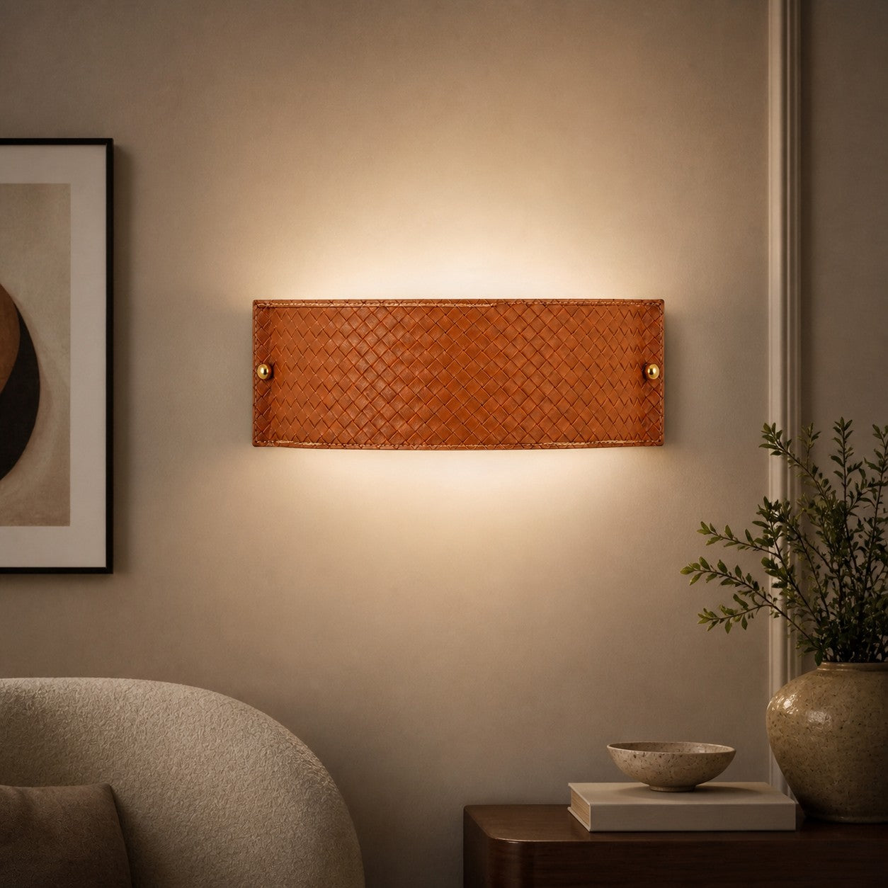 Cognac woven leather wall lamp in a warm interior