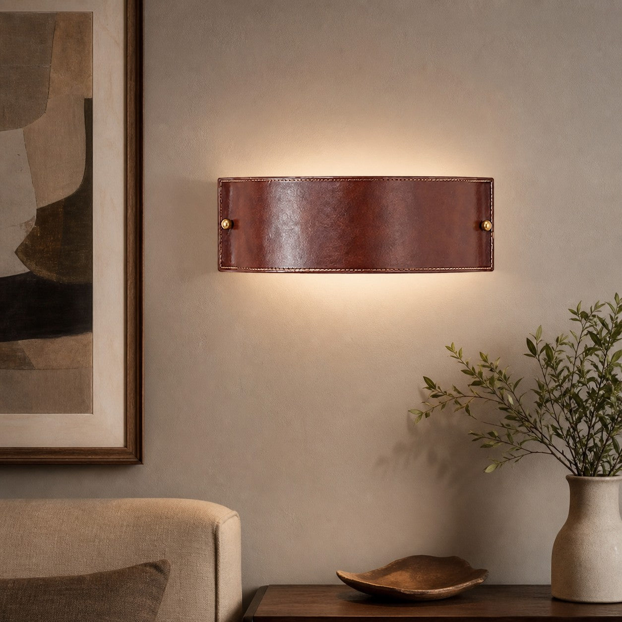 Vintage brown leather wall lamp in a warm living room