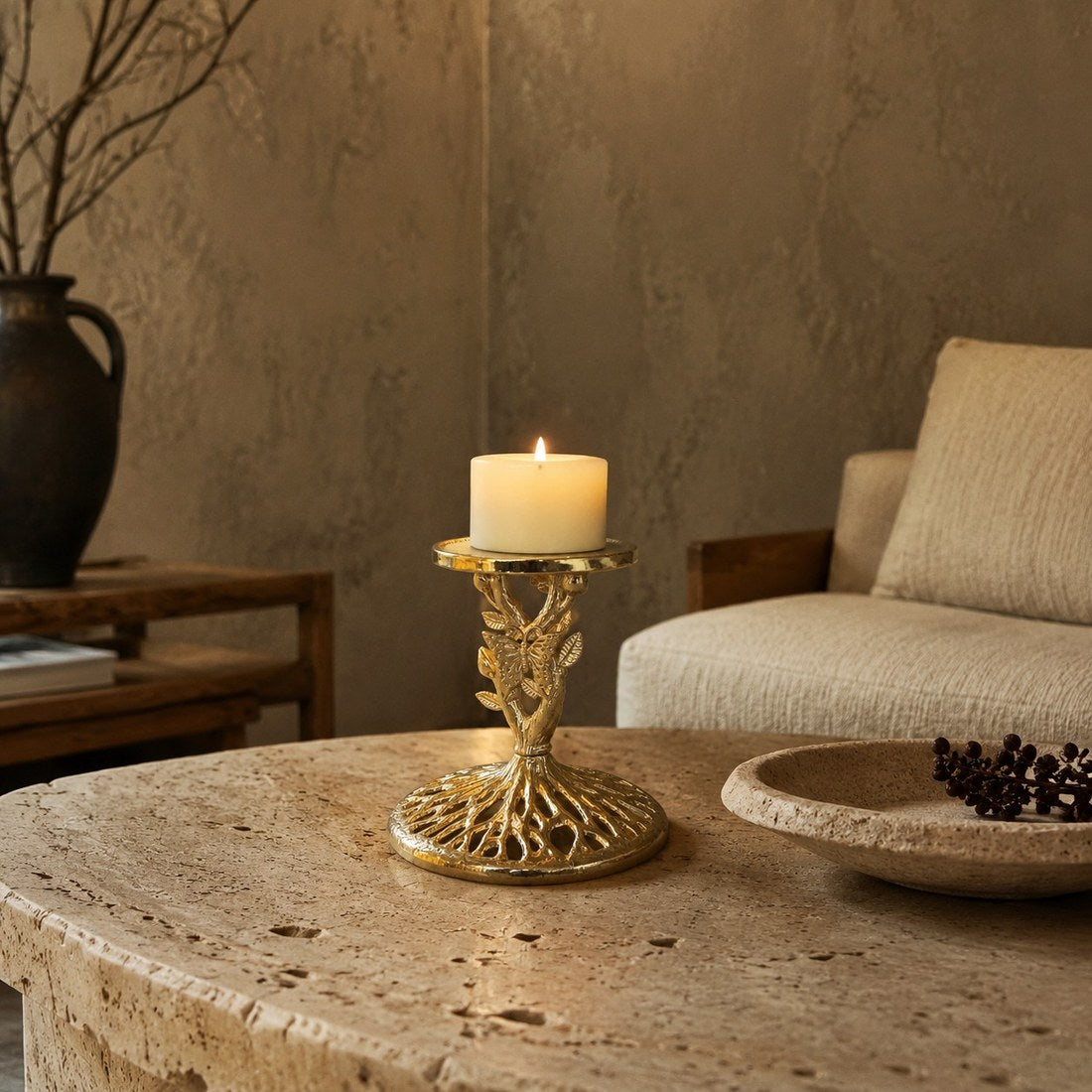 Aura candlestick holding a candle in a warm interior