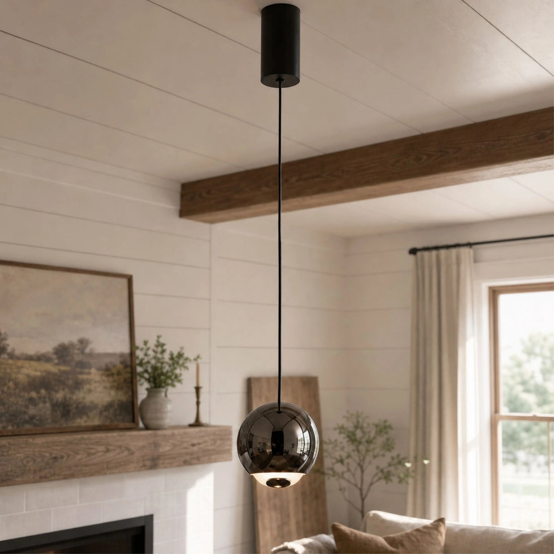 Pearl Black mirrored orb pendant in a bright home interior