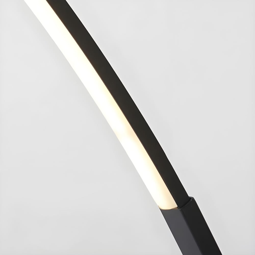 Lirra Minimal Curved Floor Lamp – Elegant Metal Accent for Living Spaces