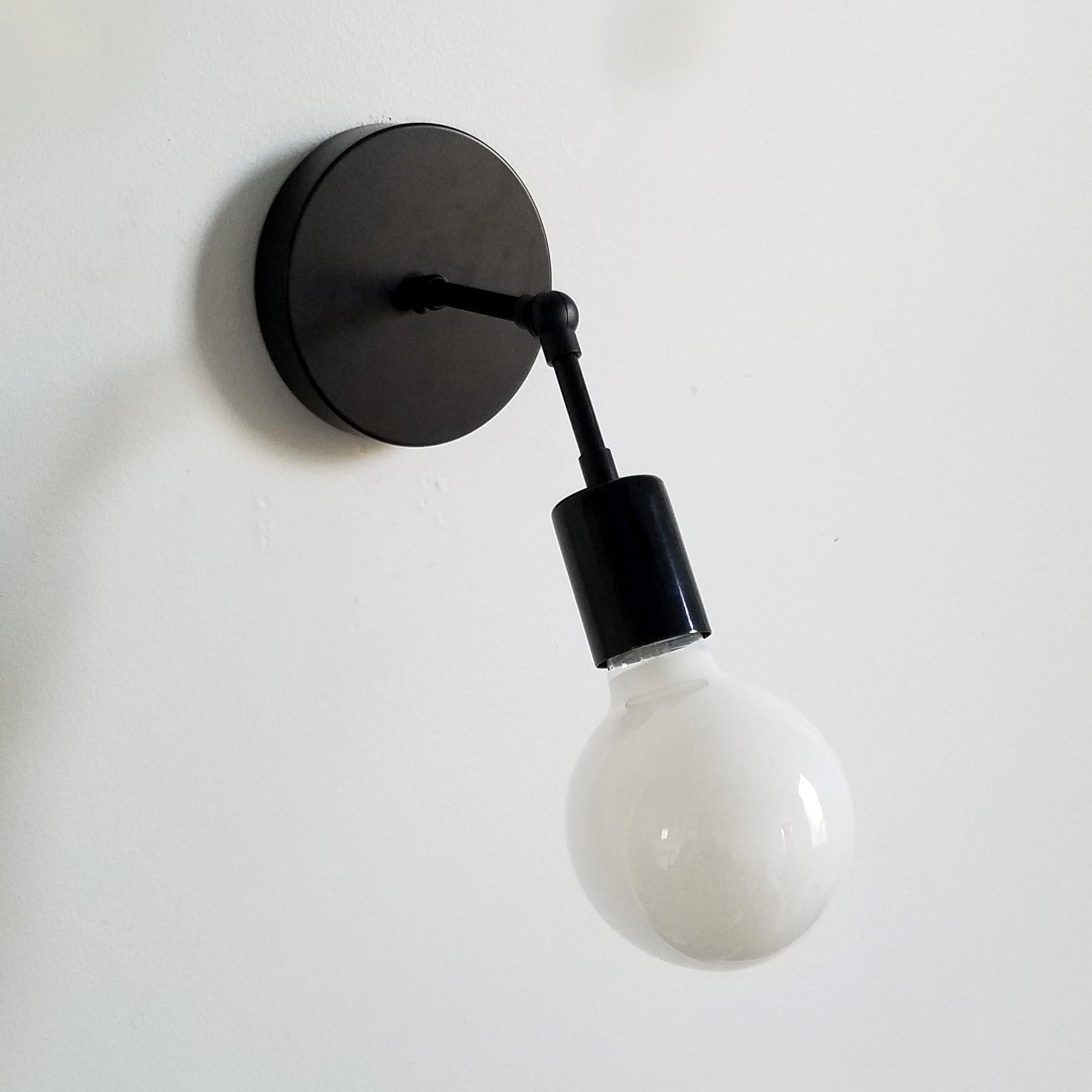 Black Swivel Functional Wall Sconce - Stylish Bedroom & Bathroom Accent