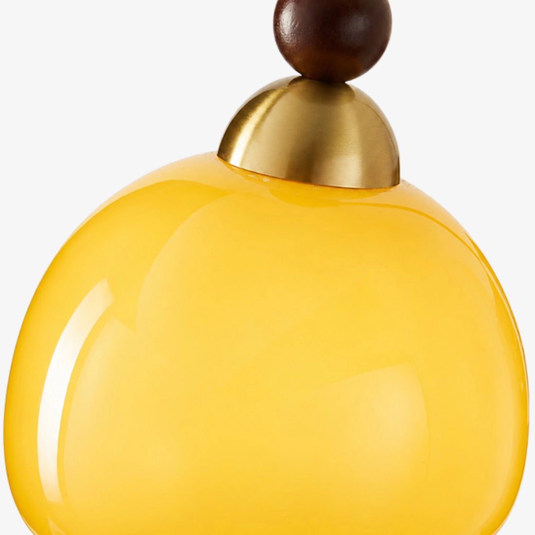 Brass-toned cap detail