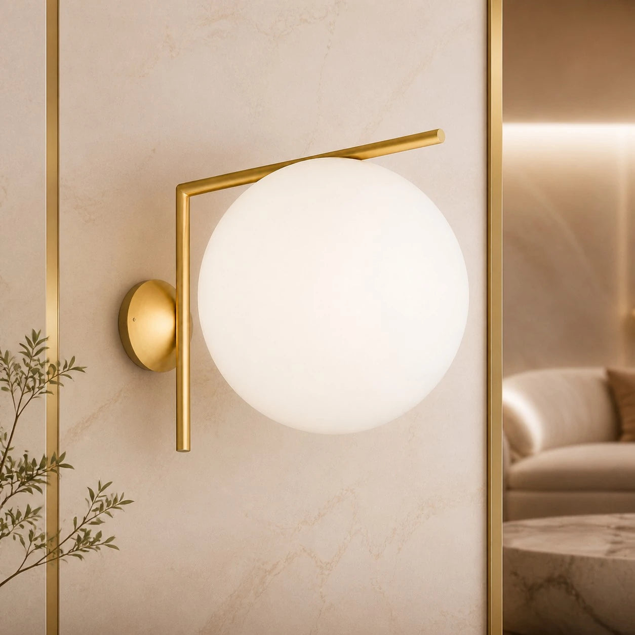 Gold offset globe wall sconce in a warm bedroom