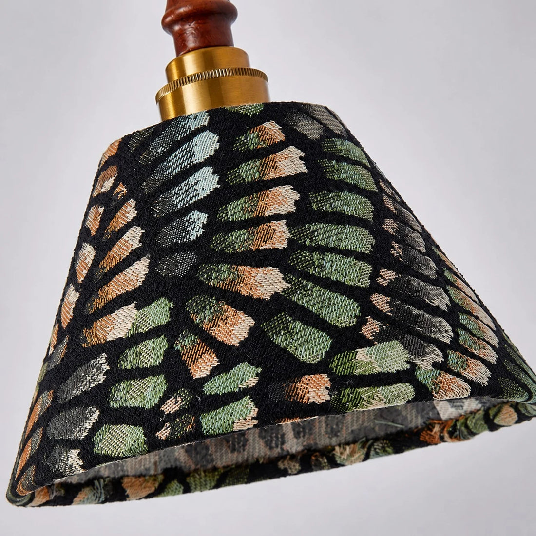 Fabric shade and wood hardware detail