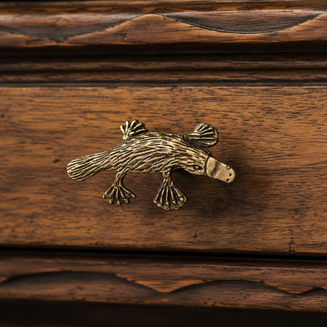 Distressed Totem platypus copper cabinet handle