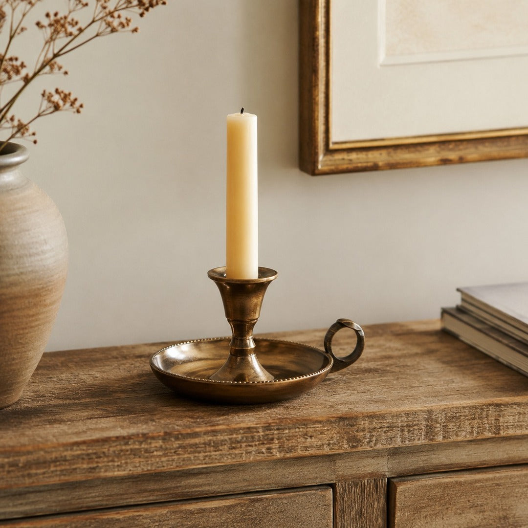 Aura candlestick on wood console