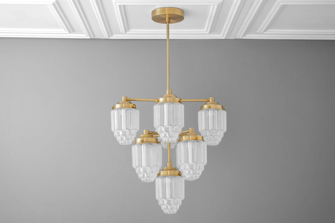 Tierlux Glass Textured Brass Chandelier – Timeless Lighting with Style