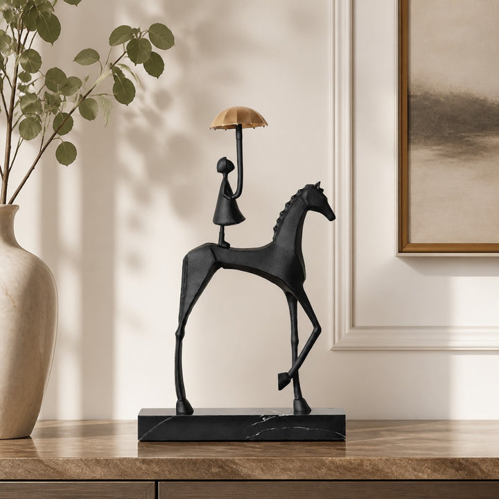 Equora horse and girl figurines on a console